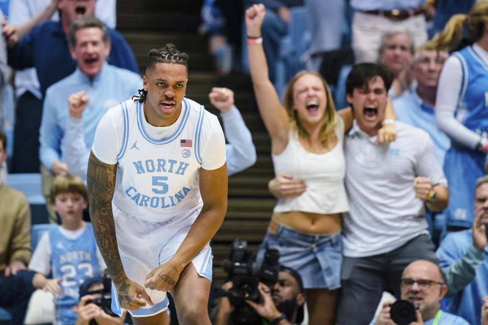 North Carolina forward Armando Bacot reacts after a dunk during the first half of the team's NCAA college basketball game against Duke on Saturday, March 4, 2023, in Chapel Hill, N.C. (AP Photo/Jacob Kupferman)