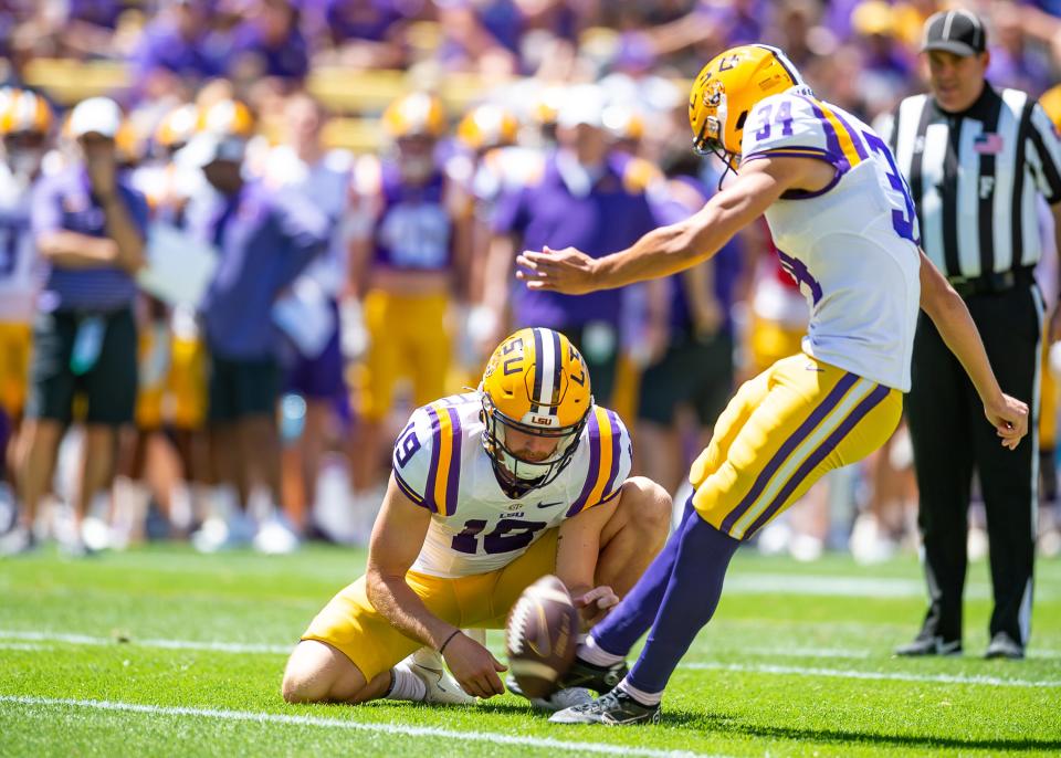 Kicker Damian Ramos with Jay Bramblett 19 holding during the  LSU Tigers Spring Game at Tiger Stadium in Baton Rouge, LA. SCOTT CLAUSE/USA TODAY NETWORK.  Saturday, April 22, 2023.