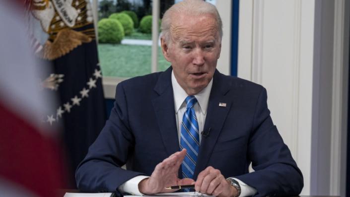 U.S. President Joe Biden speaks while joining the White House Covid-19 Response Team's call in the Eisenhower Executive Office Building in Washington, D.C., U.S., on Monday, Dec. 27, 2021. Photographer: Ken Cedeno/UPI/Bloomberg via Getty Images <span class="copyright">Ken Cedeno/UPI/Bloomberg via Getty Images</span>