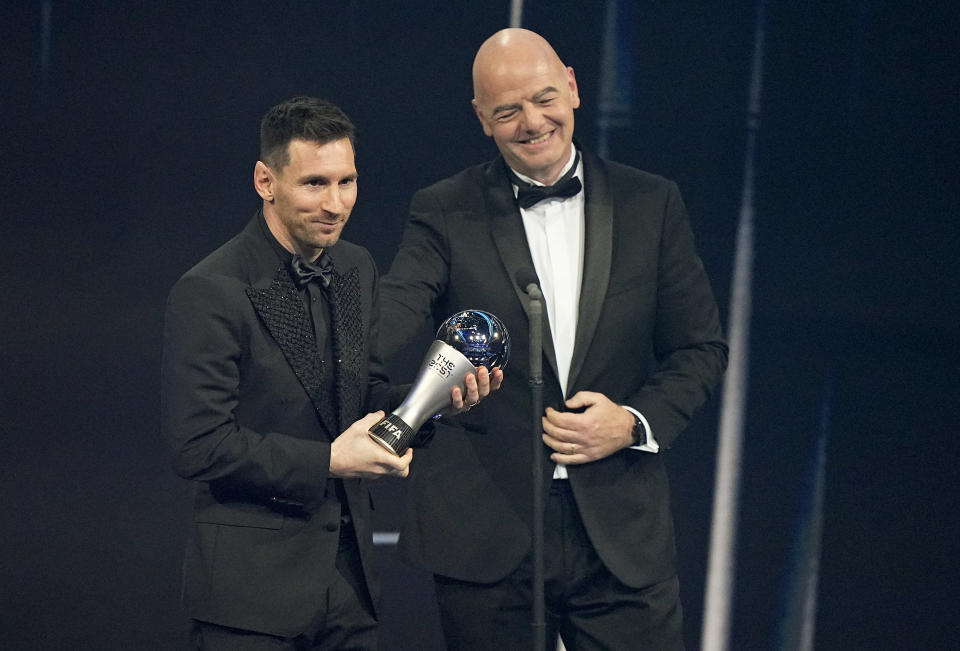 Argentina's Lionel Messi receives the Best FIFA Men's player award from FIFA president Gianni Infantino during the ceremony of the Best FIFA Football Awards in Paris, France, Monday, Feb. 27, 2023. (AP Photo/Michel Euler)