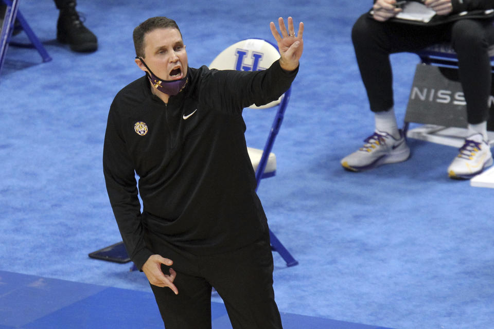 LSU head coach Frank Wade calls a play during the first half of an NCAA college basketball game against Kentucky in Lexington, Ky., Saturday, Jan. 23, 2021. (AP Photo/James Crisp)