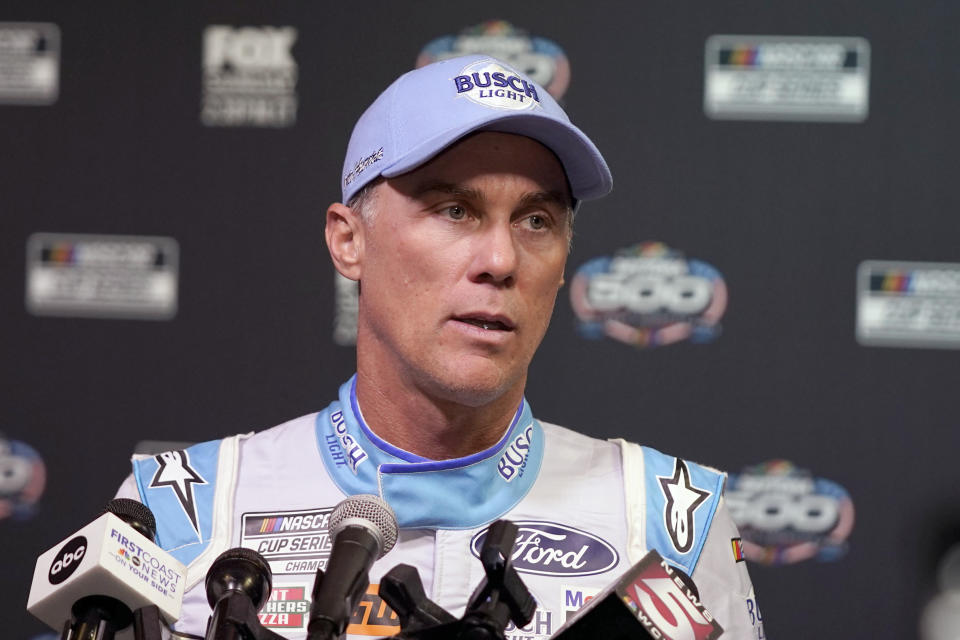 FILE - Kevin Harvick speaks during NASCAR Daytona 500 auto racing media day at Daytona International Speedway, Wednesday, Feb. 16, 2022, in Daytona Beach, Fla. NASCAR heads into its second playoff race investigating a spate of car fires that has at least one championship contender fuming. Kevin Harvick lashed out at NASCAR and the new Next Gen car after it inexplicably caught fire in the playoff opener at Darlington Raceway. (AP Photo/John Raoux, File)