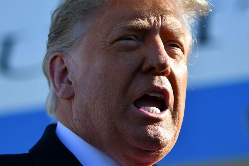 US President Donald Trump speaks to the media as he makes his way to board Air Force One before departing from Andrews Air Force Base in Maryland.