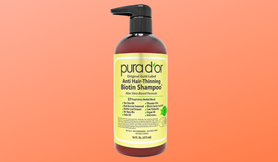 bottle of Pura D'or anti thinning shampoo