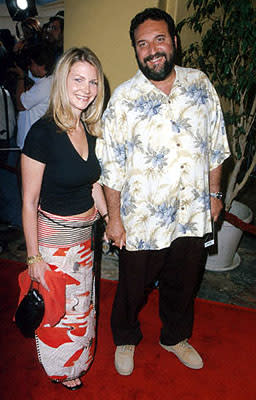 Joel Silver with his wife at the Mann's Village Theater premiere of Warner Brothers' The Perfect Storm