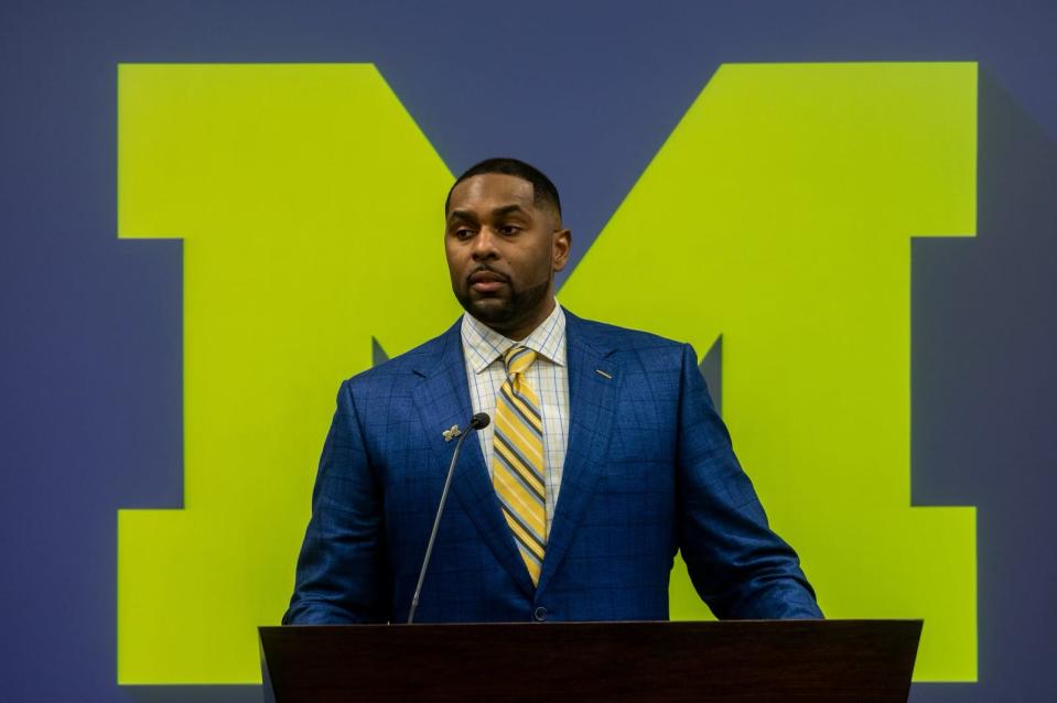 Sherrone Moore, Michigan’s new head football coach, speaks in front of family, media and faculty members during a news conference inside the Junge Family Champions Center in Ann Arbor on Saturday, Jan. 27, 2024.