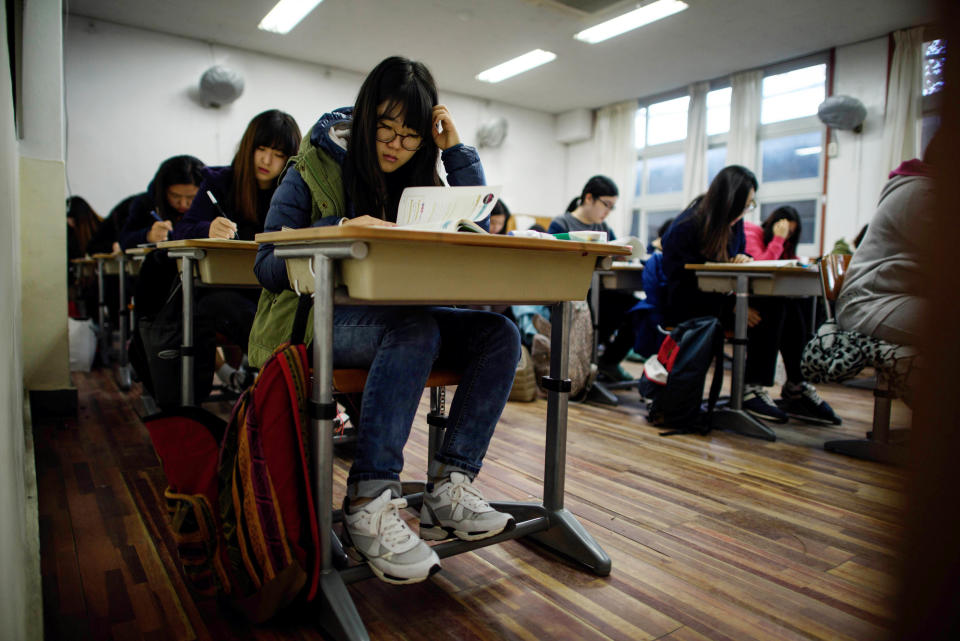 Students take&nbsp;the annual Scholastic Aptitude Test at the Poongmun high school in Seoul on November 13, 2014.&nbsp;