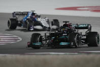 Mercedes driver Lewis Hamilton of Britain in action during the Qatar Formula One Grand Prix. In Lusail, Qatar, Sunday, Nov. 21, 2021. (AP Photo/Darko Bandic)