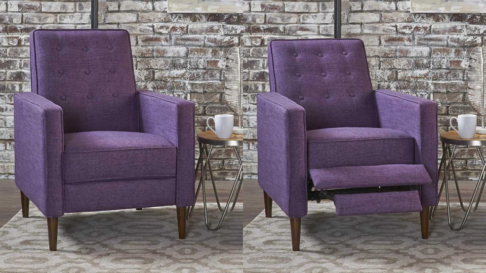 The tufted-button back and slim wooden legs offer minimalist style through mixed materials.