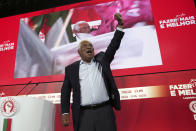 In this Sept. 24, 2019 file picture, Portuguese Prime Minister and Socialist Party leader Antonio Costa raises his fist during a campaign rally in Lisbon. The two mainstream parties are expected to garner most votes in Sunday's national General Election ballot, with the center-left Socialist Party showing an opinion poll lead of at least 7 percentage points over the center-right Social Democratic Party. (AP Photo/Armando Franca)