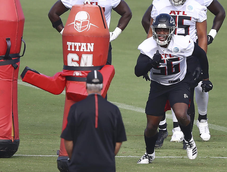 Atlanta Falcons defensive end Dante Fowler (56) runs a drill during NFL football training camp on Wednesday, Aug. 19, 2020, in Flowery Branch, Ga. (Curtis Compton/Atlanta Journal-Constitution via AP, Pool)