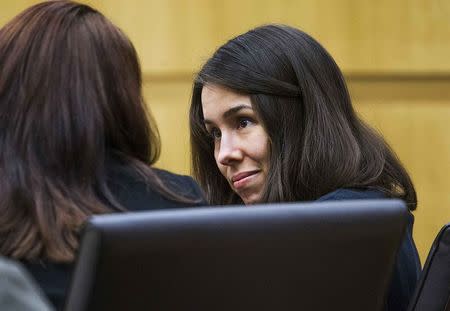 Jodi Arias (R) speaks to defense attorney Jennifer Willmott in the Maricopa County Superior Court room of Judge Sherry Stephens in Phoenix, Arizona, October 22, 2014. REUTERS/Tom Tingle/The Arizona Republic/Pool