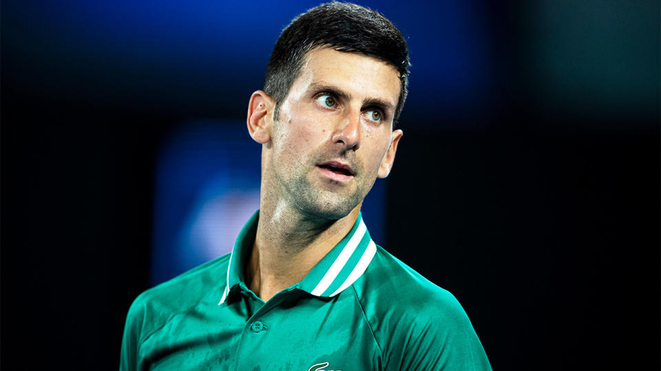 Novak Djokovic (pictured) looking at the player's box during the Australian Open.