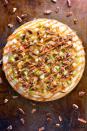 <p>Pizza for dessert? Yes, please! Use a sugar cookie crust and top with cream cheese frosting, apples, and pecans, with a drizzle of caramel as the final touch.</p><p><strong>Get the recipe at <a href="http://www.thegunnysack.com/caramel-apple-fruit-pizza/" rel="nofollow noopener" target="_blank" data-ylk="slk:The Gunny Sack;elm:context_link;itc:0;sec:content-canvas" class="link ">The Gunny Sack</a>.</strong></p>