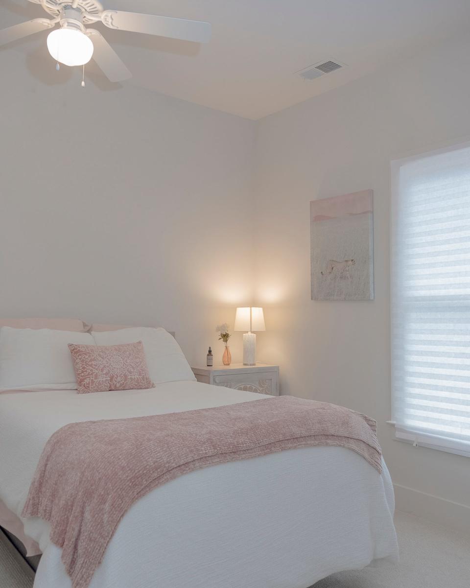 The guest bedroom is comfy and provides ample space for overnight visitors.