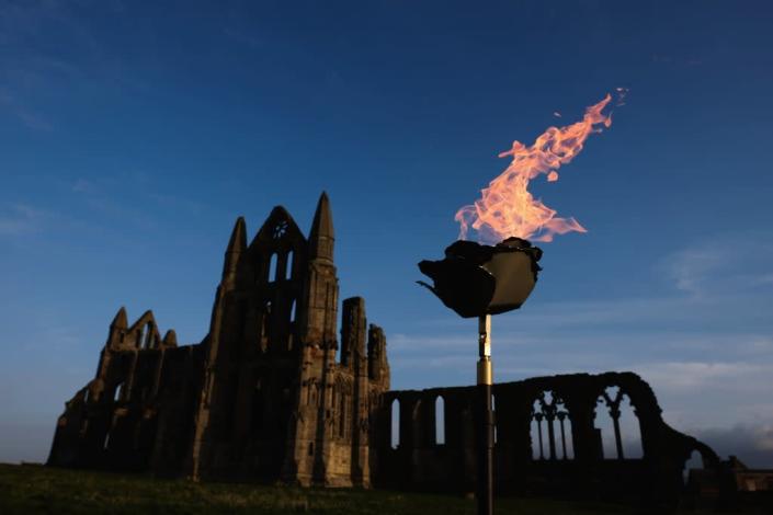 A beacon at Whitby Abbey in North Yorkshire is lit in 2016 to mark the Queen’s 90th birthday (Getty Images)