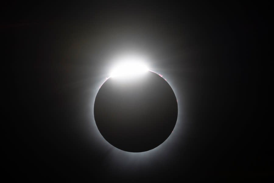 The "diamond ring" effect is seen during a total solar eclipse in Magog, Quebec, Canada, on April 8, 2024.  (Photo by STAN HONDA/AFP via Getty Images)