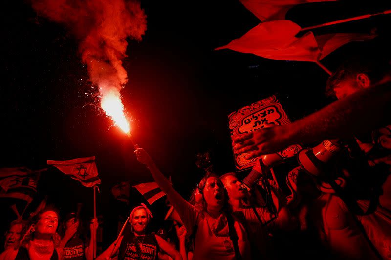 Protesters demonstrate against Israeli PM Netanyahu and his nationalist coalition government's judicial overhaul, in Tel Aviv