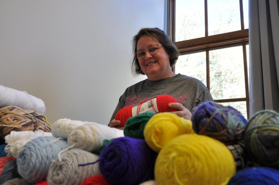 Lucy Kulbago, founder of Sew4Service, a Northeast Ohio nonprofit, is opening an Alliance chapter at The Commons at 405 S. Linden Ave. in June 2024. Pictured here, Kulbago offers sewing and knitting classes and facilitates charitable donations.