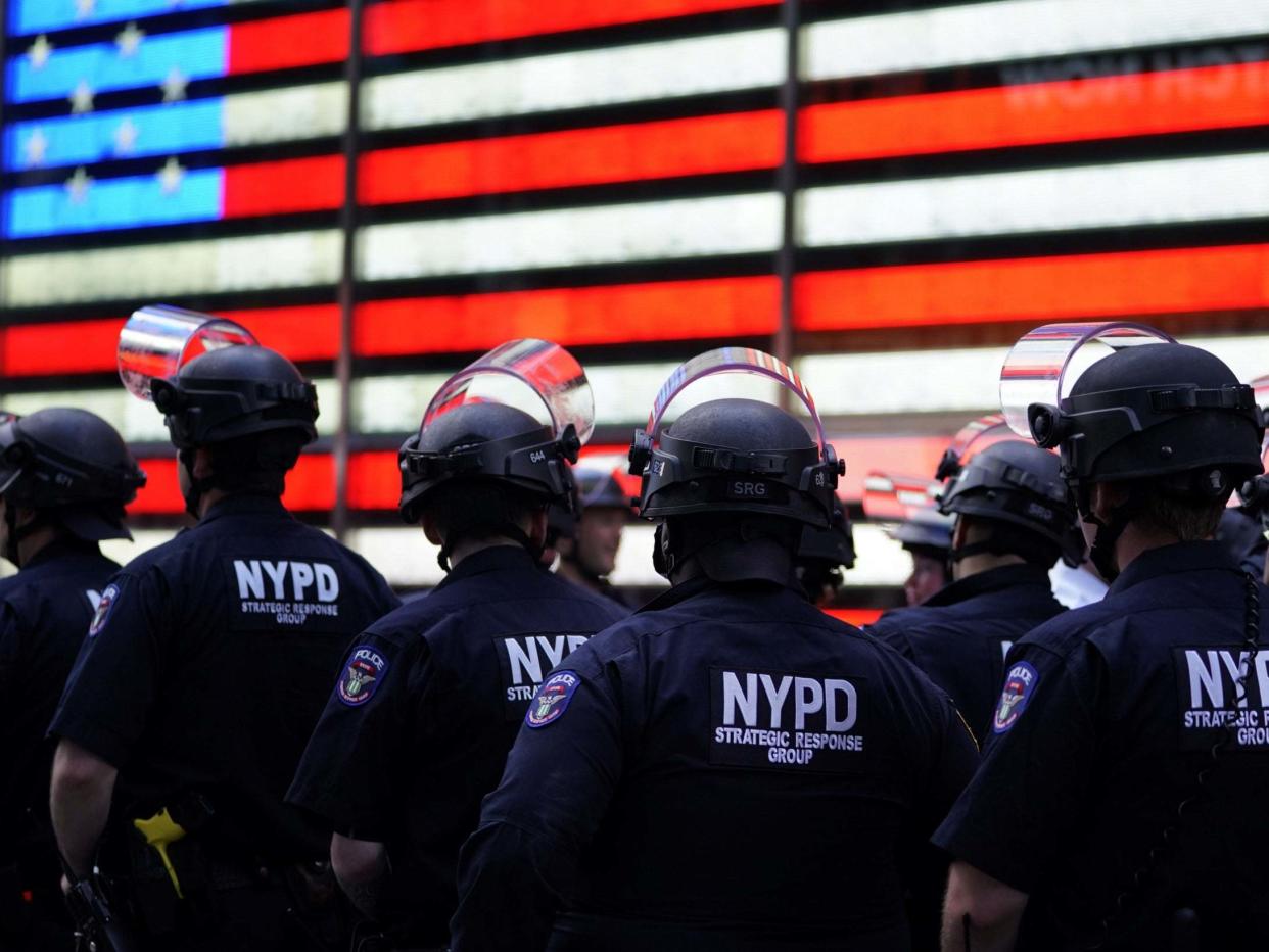 NYPD officers gather at a Black Lives Matter protest in Times Square: AFP/Getty