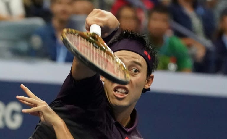 Kei Nishikori serves in his US Open semi-final loss to Novak Djokovic