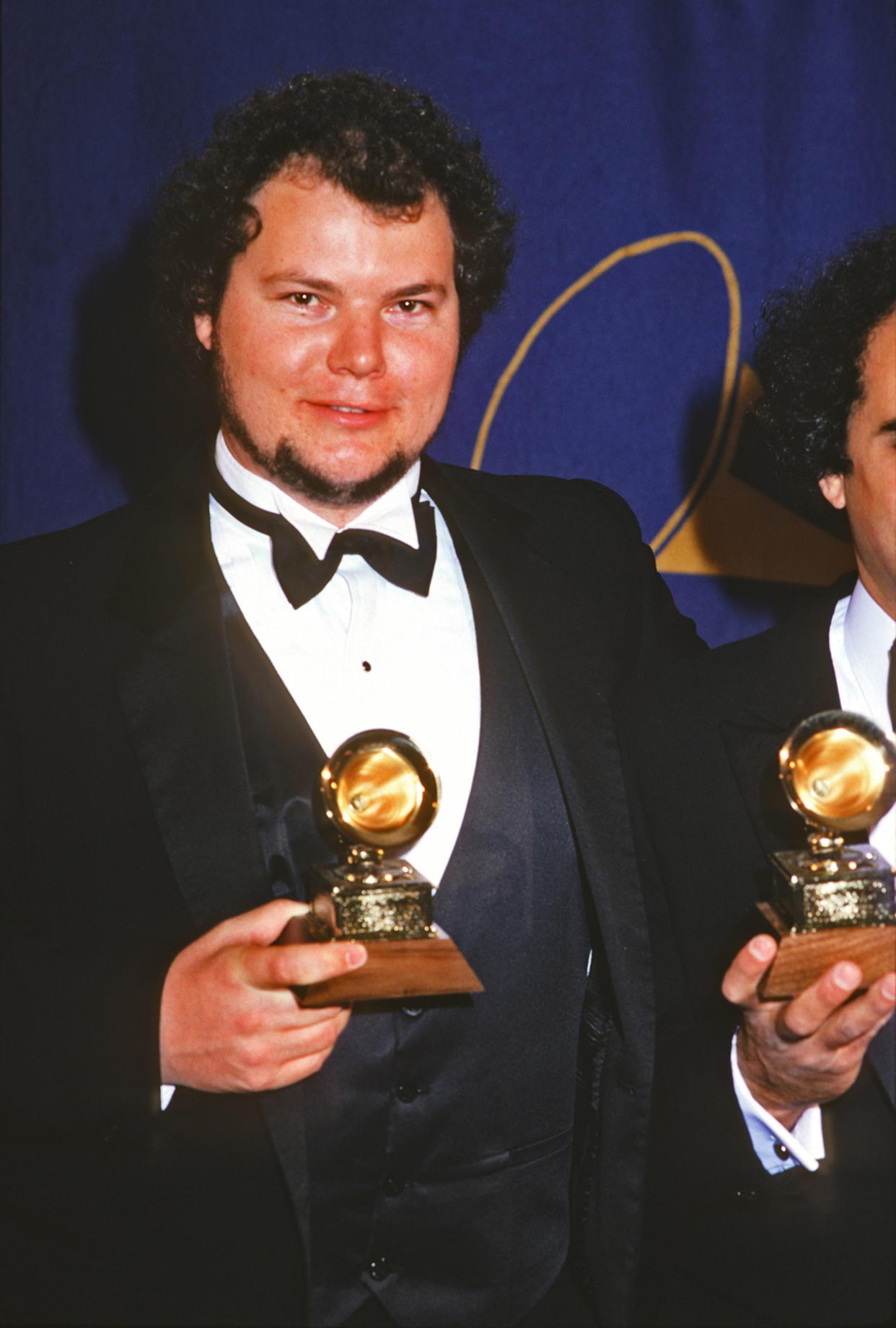 Christopher Cross poses with a Grammy Award (one of several for his song 