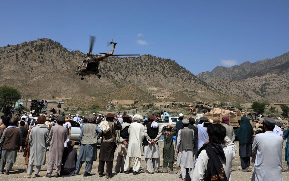 Afghans receive humanitarian aid after powerful earthquake hit eastern Afghanistan before dawn on 22 June, in Paktika - Sayed Khodaiberdi Sadat/Anadolu Agency via Getty Images