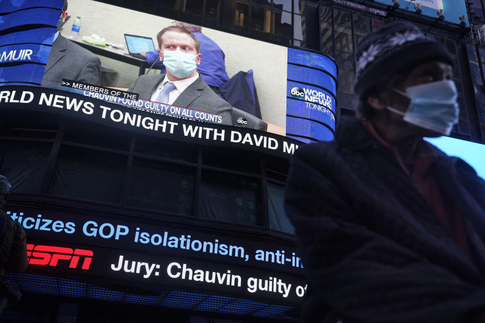 News of the verdict in the trial of former Minneapolis police Officer Derek Chauvin is displayed on a billboard in Times Square, New York, Tuesday, April 20, 2021. Chauvin has been convicted of murder and manslaughter in the death of George Floyd, the explosive case that triggered worldwide protests, violence and a furious reexamination of racism and policing in the U.S. (AP Photo/Seth Wenig)