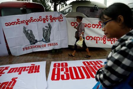 Reporters protest as they call on Myanmar government and military authorities to release reporters who were arrested in Yangon, Myanmar June 30, 2017. REUTERS/Soe Zeya Tun