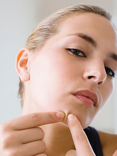 <div class="caption-credit"> Photo by: Getty Images</div><div class="caption-title">Stressing about adult acne</div>Zits aren't only for teenagers. In fact, acne may affect more than half of adult women at some point in their lives, according to a study in the Journal of the American Academy of Dermatology. "Stress triggers your adrenal glands to release extra cortisol, which in turn stimulates sweat and oil production to aggravate breakouts," says Jeffrey R. LaDuca, Ph.D., M.D, president of Reflections Dermatology & Psoriasis Center in Auburn and Skaneateles, NY. You can lower the levels of stress hormones in your body by getting at least seven hours of sleep and cutting back on simple carbohydrates and sugar that boost inflammation. <br> <b><br> More from REDBOOK: <br></b> <ul> <li> <a rel="nofollow noopener" href="http://www.redbookmag.com/love-sex/advice/marriage/iconic-kisses-in-history?link=rel&dom=yah_life&src=syn&con=blog_redbook&mag=rbk" target="_blank" data-ylk="slk:The Most Iconic Kisses of All Time;elm:context_link;itc:0;sec:content-canvas" class="link ">The Most Iconic Kisses of All Time</a> </li> <li>  <br> </li> </ul>