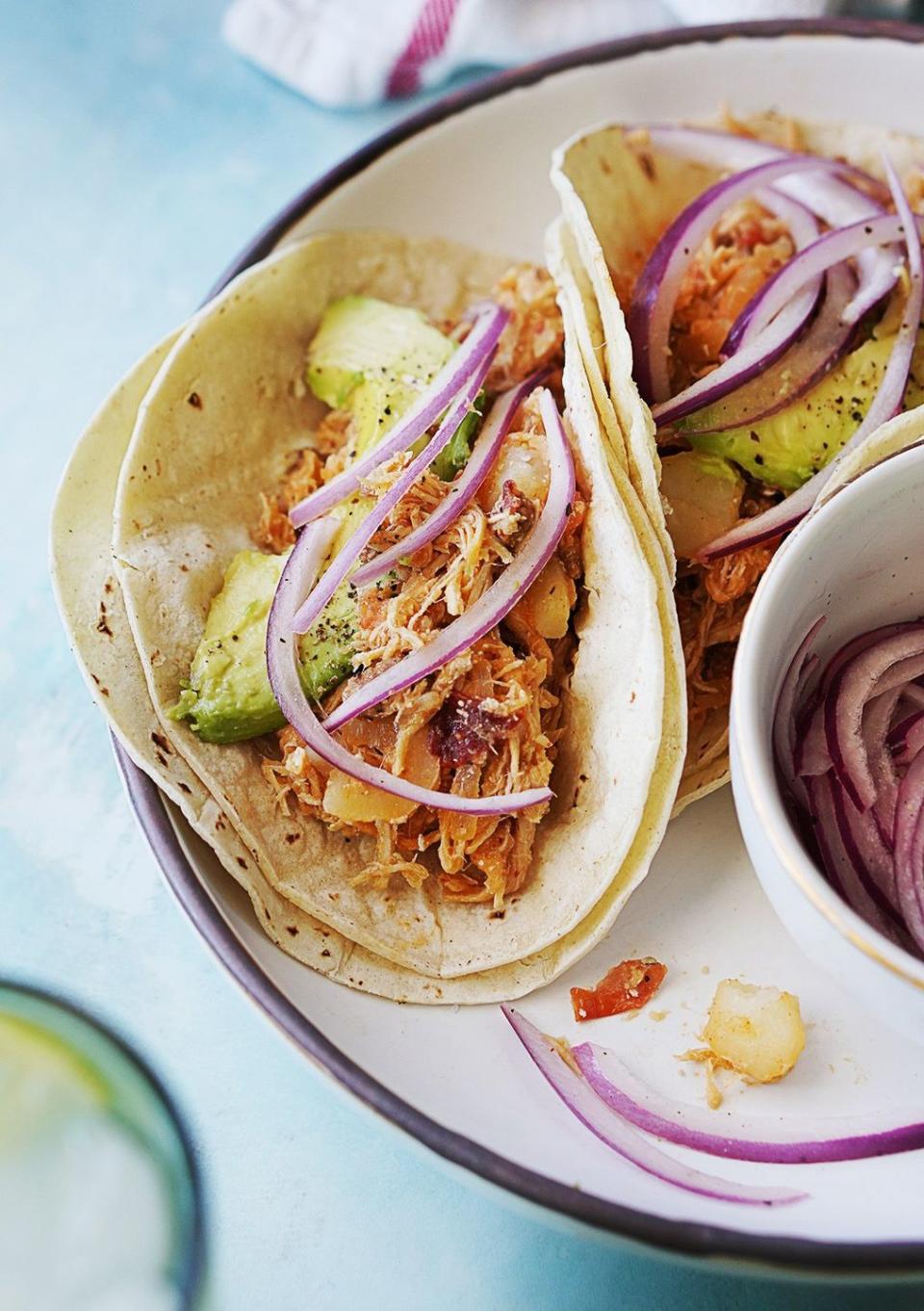 <p>These flavorful chicken tacos from the city of Puebla are cooked in a smoky tomato-chipotle sauce that has a hint of spice. You can use shredded <a href="https://www.thepioneerwoman.com/food-cooking/meals-menus/g35785500/recipes-using-rotisserie-chicken/" rel="nofollow noopener" target="_blank" data-ylk="slk:rotisserie chicken;elm:context_link;itc:0;sec:content-canvas" class="link ">rotisserie chicken</a> for easy weeknight cooking.</p><p><strong>Get the recipe at <a href="https://www.muydelish.com/chicken-tinga/#wprm-recipe-container-7290" rel="nofollow noopener" target="_blank" data-ylk="slk:Muy Delish;elm:context_link;itc:0;sec:content-canvas" class="link ">Muy Delish</a>. </strong></p><p><a class="link " href="https://go.redirectingat.com?id=74968X1596630&url=https%3A%2F%2Fwww.walmart.com%2Fsearch%2F%3Fquery%3Dpioneer%2Bwoman%2Bsaucepan&sref=https%3A%2F%2Fwww.thepioneerwoman.com%2Ffood-cooking%2Fmeals-menus%2Fg36008054%2Ftypes-of-tacos%2F" rel="nofollow noopener" target="_blank" data-ylk="slk:SHOP SAUCE PANS;elm:context_link;itc:0;sec:content-canvas">SHOP SAUCE PANS</a><strong><br></strong></p>