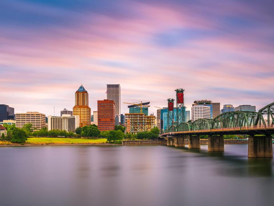 Portland, Oregon, USA skyline at dusk on the Willamette River.