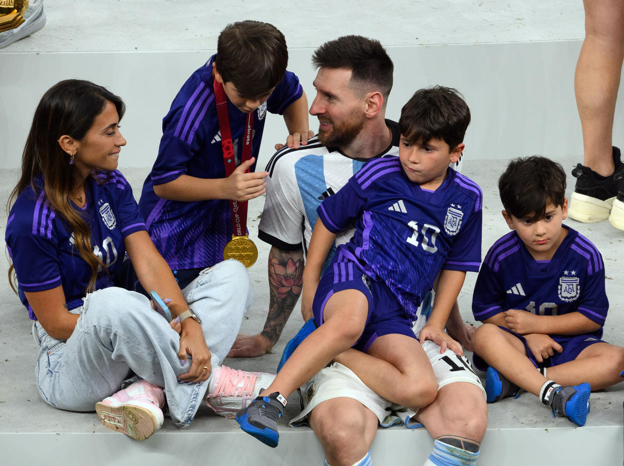 Lionel Messi with wife Antonela Roccuzzo and sons on the podium. (Robert Michael / picture alliance via Getty Images)