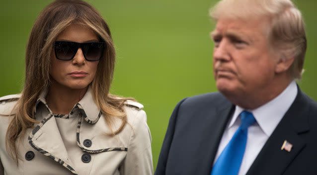 Conspiracy theorists believe Melania Trump had a body double stand in for her during Donald Trump's press conference about hurricane relief for Puerto Rico on Friday (pictured). Photo: Getty