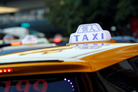 A taxi waits in a street in Taipei, Taiwan January 26, 2017. Picture taken January 26, 2017. REUTERS/Tyrone Siu