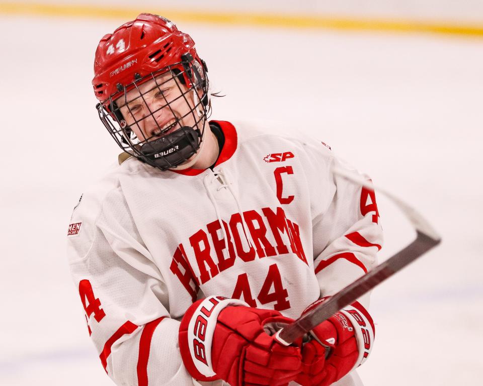 Hingham's Paul Dzavik winces during a game against Duxbury at Pilgrim Skating Arena in Hingham on Monday, January 29, 2024.