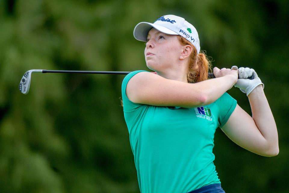 Peoria Notre Dame's Ella Coulter watches her tee shot on No. 8 during the Class 1A Girls Golf Regional on Thursday, Sept. 28, 2023 at Kellogg Golf Course in Peoria.