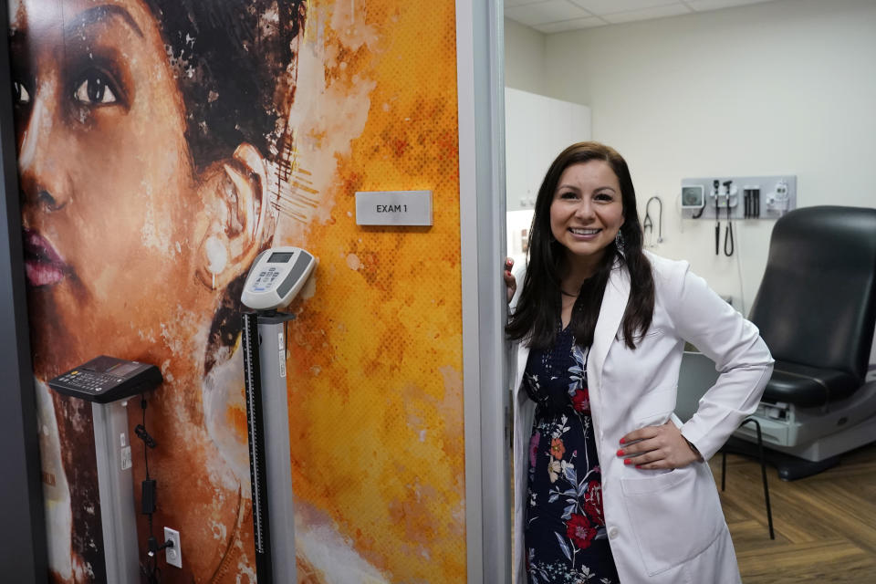 Brenda Olmos, a nurse practitioner who focuses on the geriatric population and Hispanic patients poses for a photo, Tuesday, March 9, 2021, in Austin, Texas. Olmos said the real problem with misinformation about the coronavirus is not just bad actors spreading lies — it’s people believing false claims because they aren’t as comfortable navigating often complex medical findings. ​(AP Photo/Eric Gay