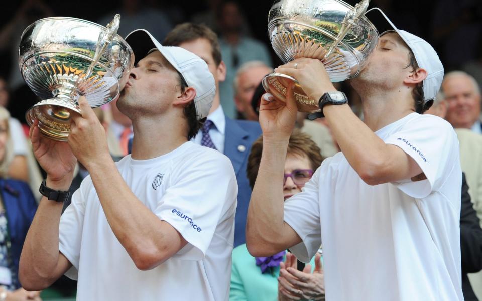 The Bryan brothers celebrate their Wimbledon success of 2013 - EPA