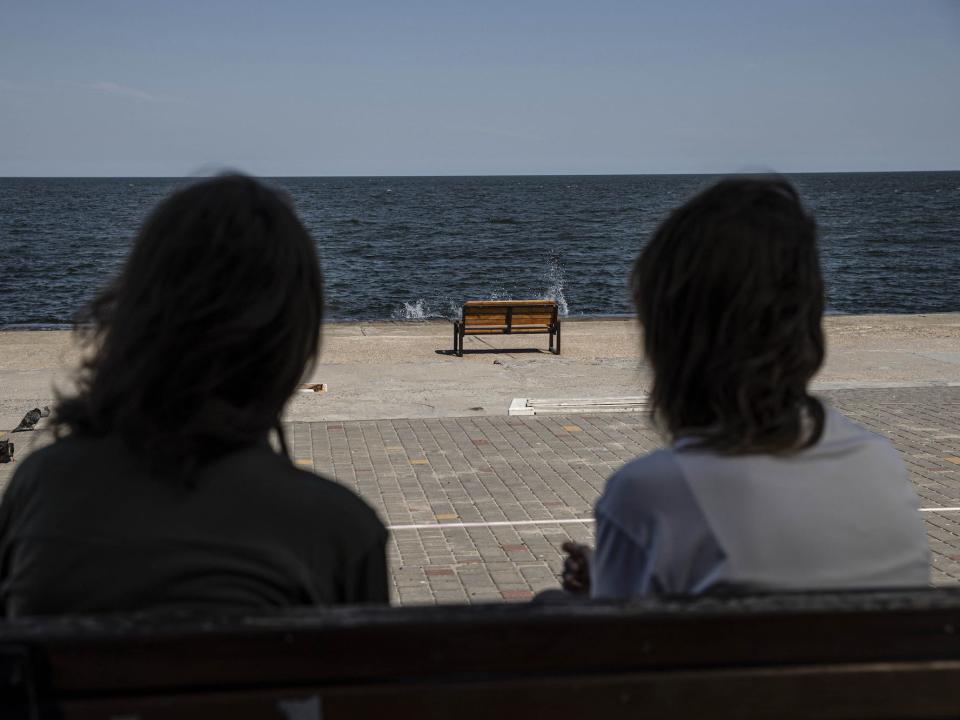 Two people looking out at the Black Sea.