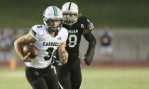 FILE - Southlake Carroll quarterback Quinn Ewers (3) runs for a first down against Permian during the first half of a high school football game in Odessa, Texas, in this Friday night Sept. 13, 2019, file photo. Third-year Ohio State coach Ryan Day opens a preseason camp for the first time without a good idea of who will be the starting quarterback. Quinn Ewers, the top quarterback prospect in the class of 2022 who says he is skipping his senior year of high school in Texas and plans to enroll at Ohio State is the wildcard. (Ben Powell/Odessa American via AP, File)