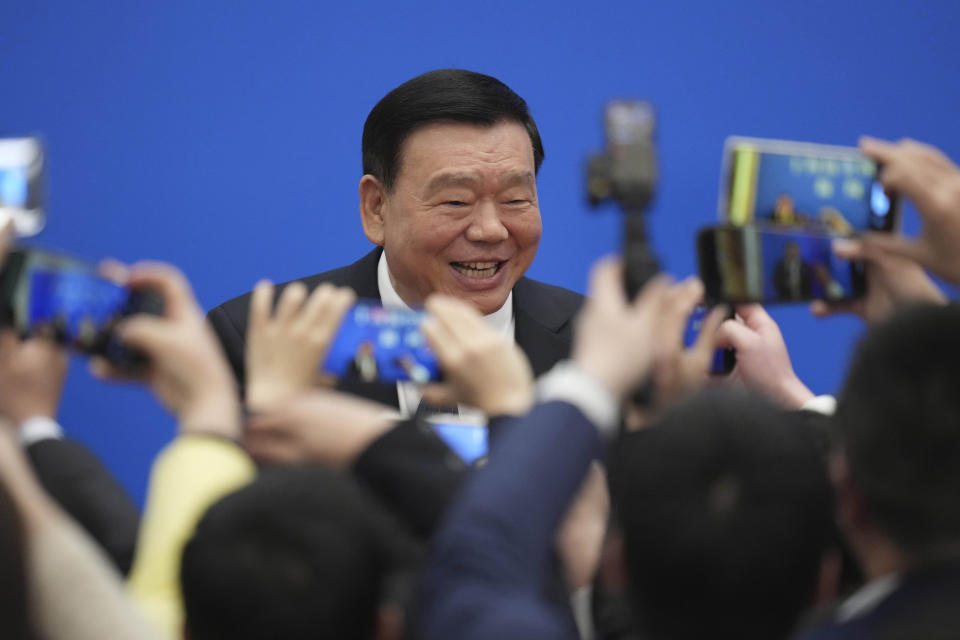 National People's Congress spokesperson Lou Qinjian poses for photo after a press conference on the eve of the National People's Congress at the Great Hall of the People in Beijing, Monday, March 4, 2024. (AP Photo/Tatan Syuflana).