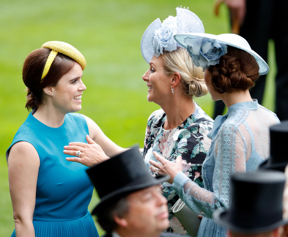 Zara Tindall embraces cousin Princess Eugenie.<em> [Photo: Getty]</em>