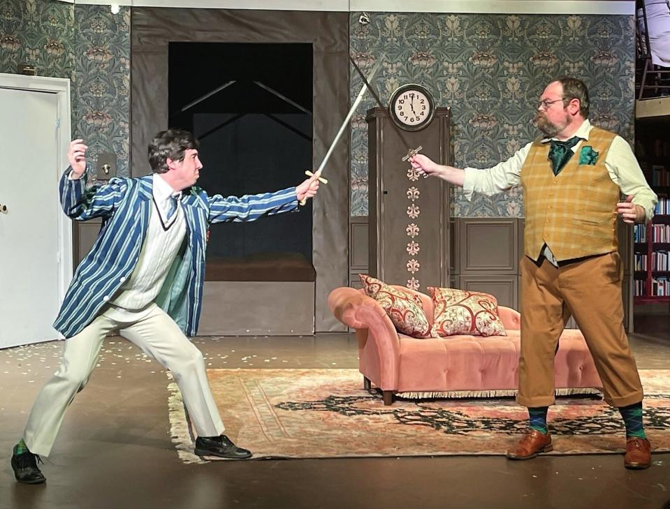 Quinn Wherley and Leonard Hayhurst rehearse a scene from "The Play that Goes Wrong" opening for the Coshocton Footlight Players at the Triple Locks Theater.