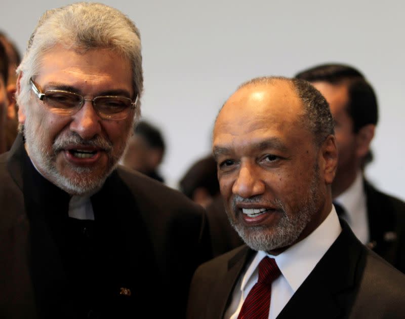 FILE PHOTO: AFC President Mohamed Bin Hammam and Paraguayan President Fernando Lugo talk during a visit to the Bourbon Conmebol Convention Hotel in Luque