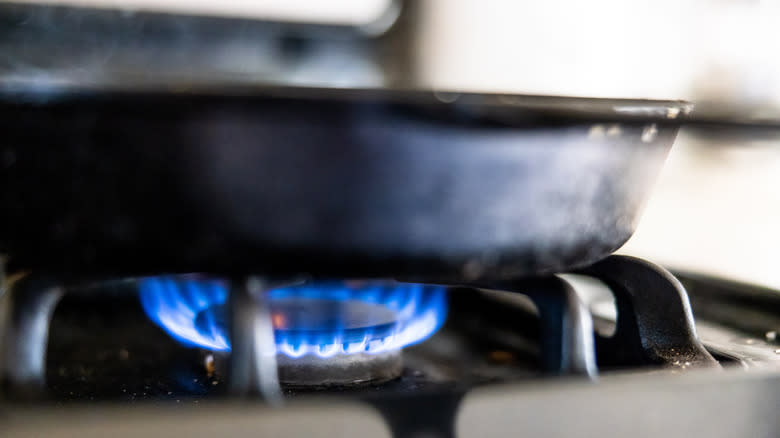 Cast iron pan on gas stove