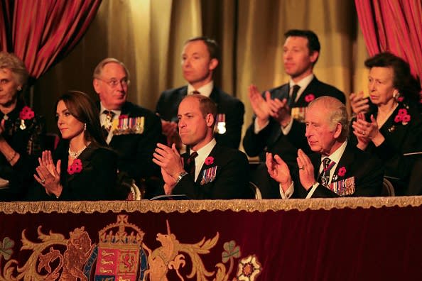 <div class="inline-image__caption"><p>Britain's Catherine, Princess of Wales, (L) Britain's Prince William, Prince of Wales (2L) and Britain's King Charles III (R) attend the annual Royal British Legion Festival of Remembrance at the Royal Albert Hall in London on November 12, 2022.</p></div> <div class="inline-image__credit">CHRIS RADBURN/POOL/AFP via Getty Images</div>