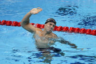 Caeleb Dressel, of the United States, celebrates after winning the gold medal in the men's 50-meter freestyle final at the 2020 Summer Olympics, Sunday, Aug. 1, 2021, in Tokyo, Japan. (AP Photo/Jae C. Hong)