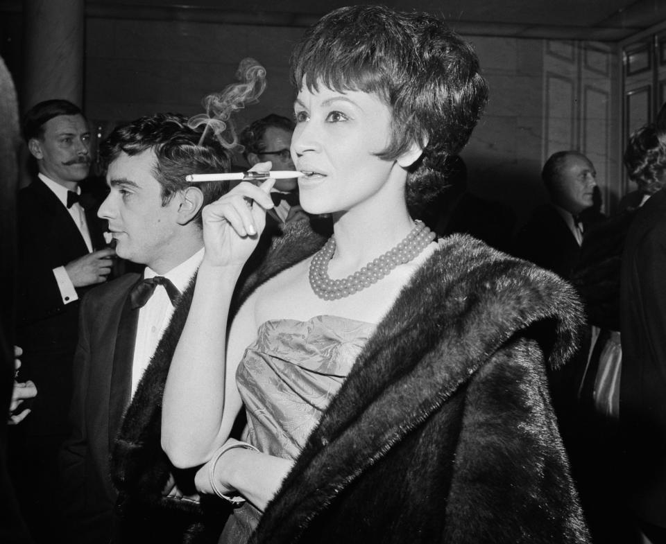 Chita Rivera in 1962 at an awards ceremony at the Savoy in London, next to Dudley Moore