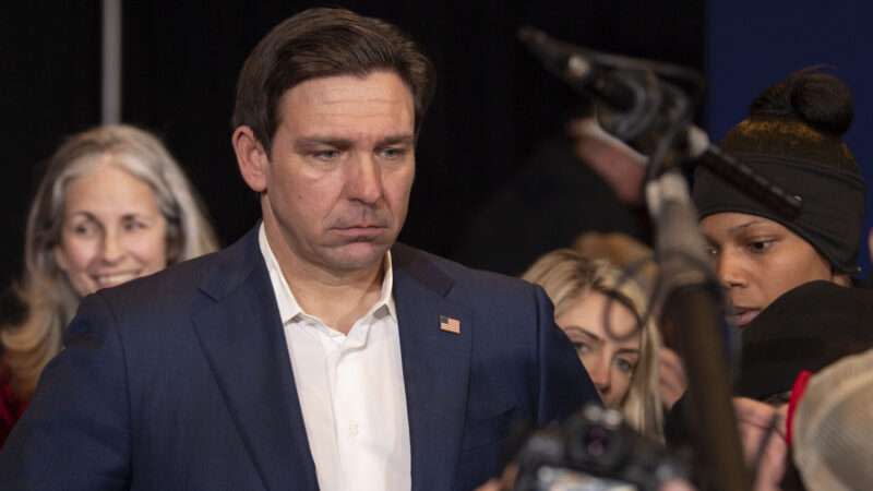 Ron DeSantis with a solemn look on his face